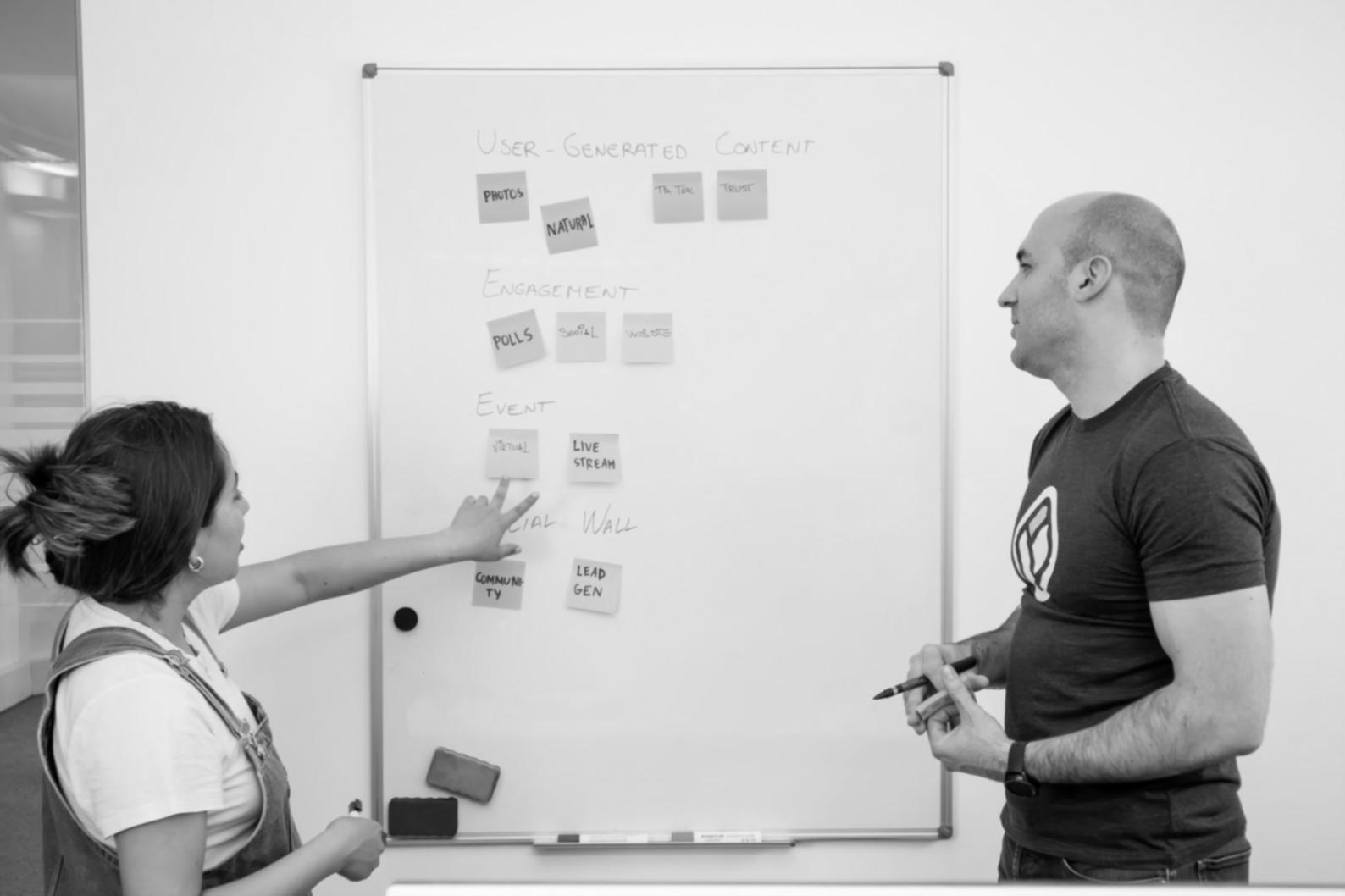 Small group financial analysis workshop showing participants working with business data